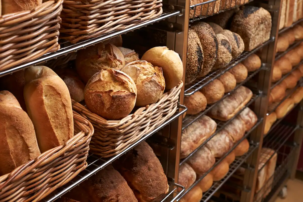 assortment of breads on shelves