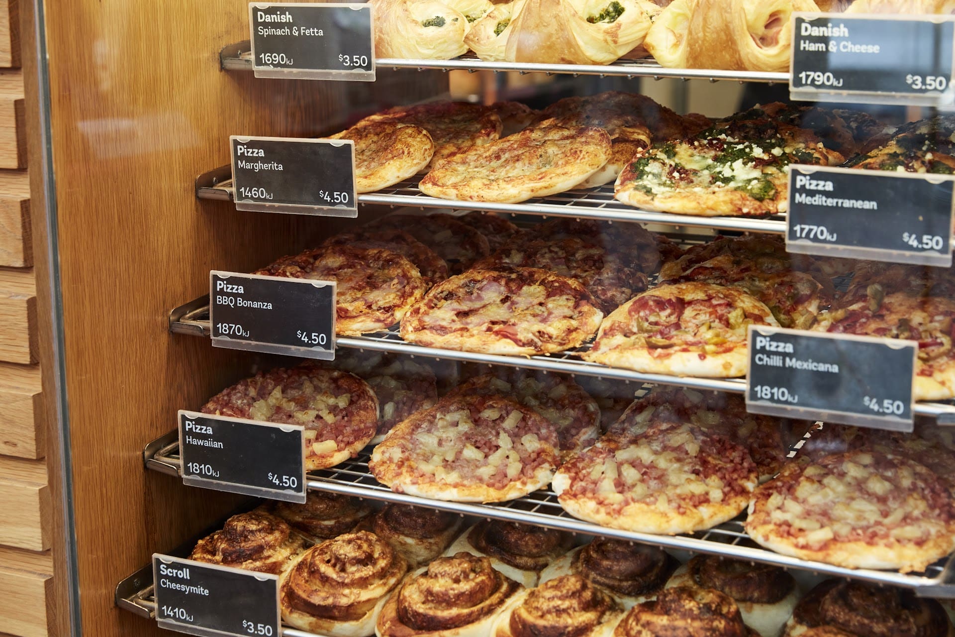 close up of pastries on racks